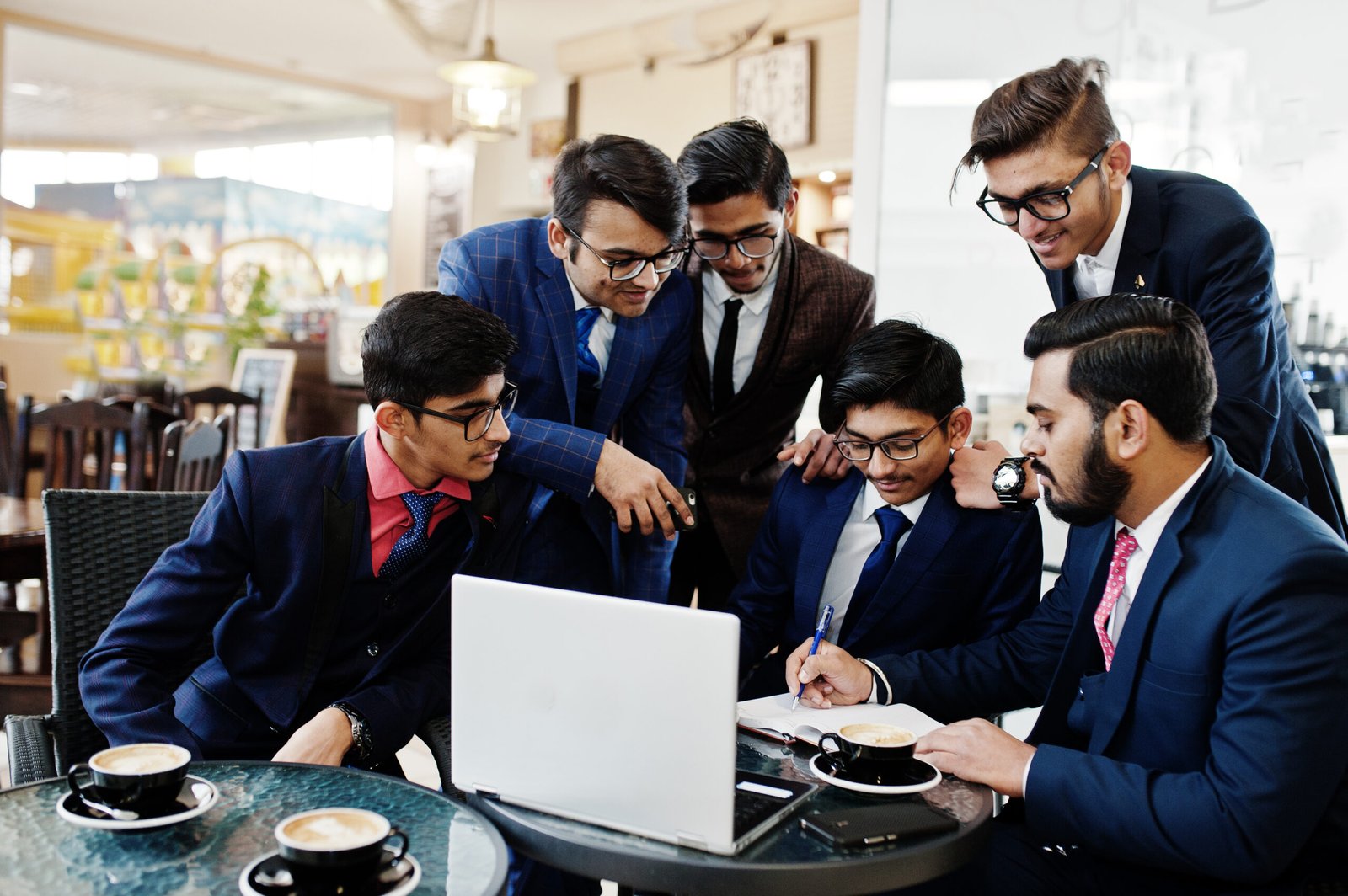 http://eithm.technowebsolutions.in/wp-content/uploads/2026/04/collaborative-process-indian-business-mans-brainstorming-meeting-officediverse-team-young-people-dressed-suits-cooperating-developing-common-project-scaled.jpg